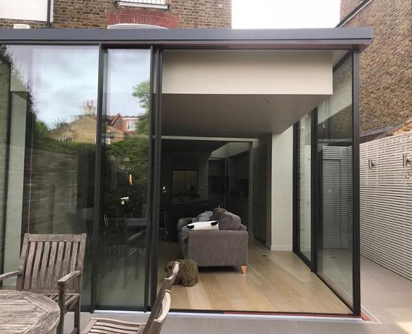 Glass wall garden room, home extension 