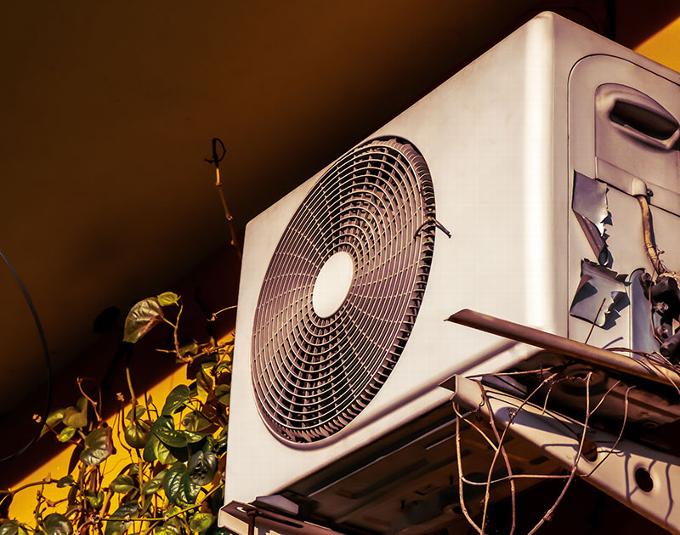 Heat pump on building exterior